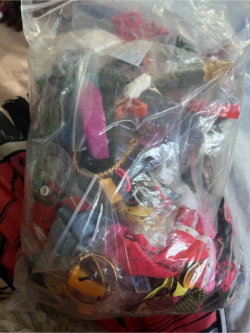 Huge bag of LOL OMG clothes and accessories